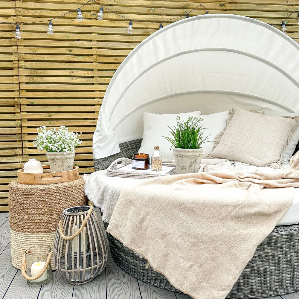 Divano coperto da giardino rattan grigio SYLT LUX