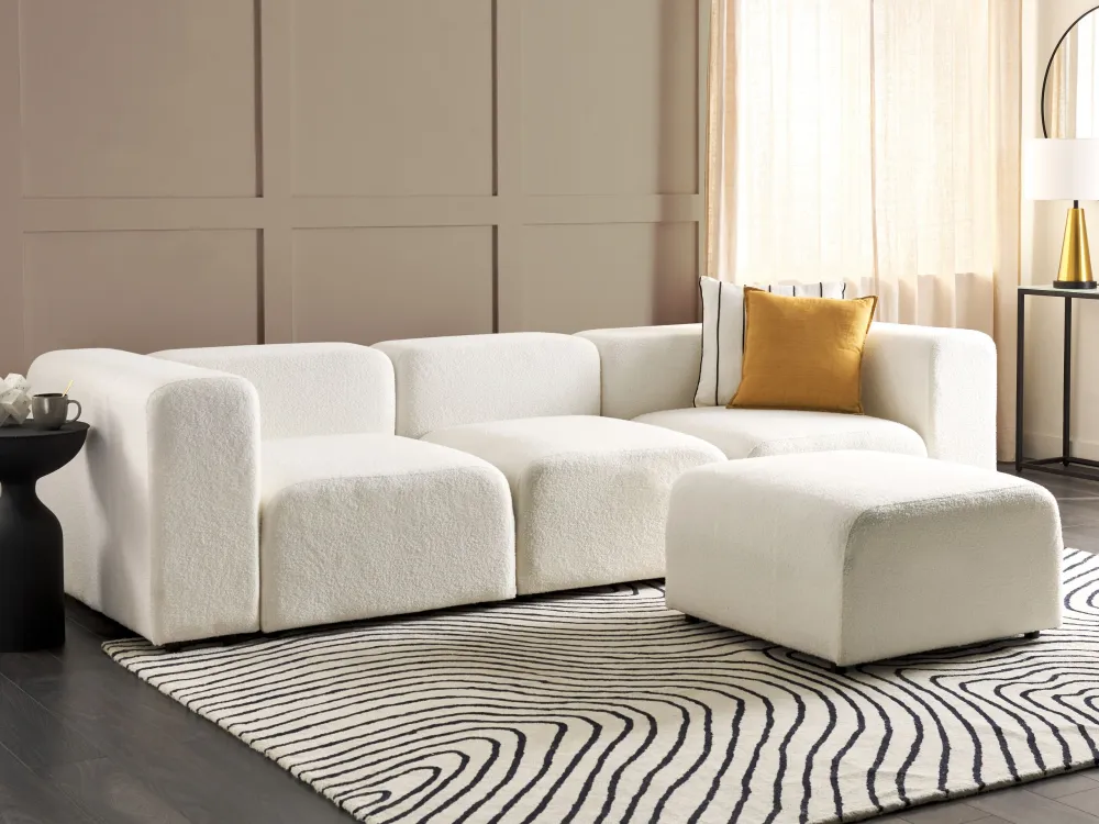 Divano componibile bouclé bianco 3 posti con pouf FALSTERBO