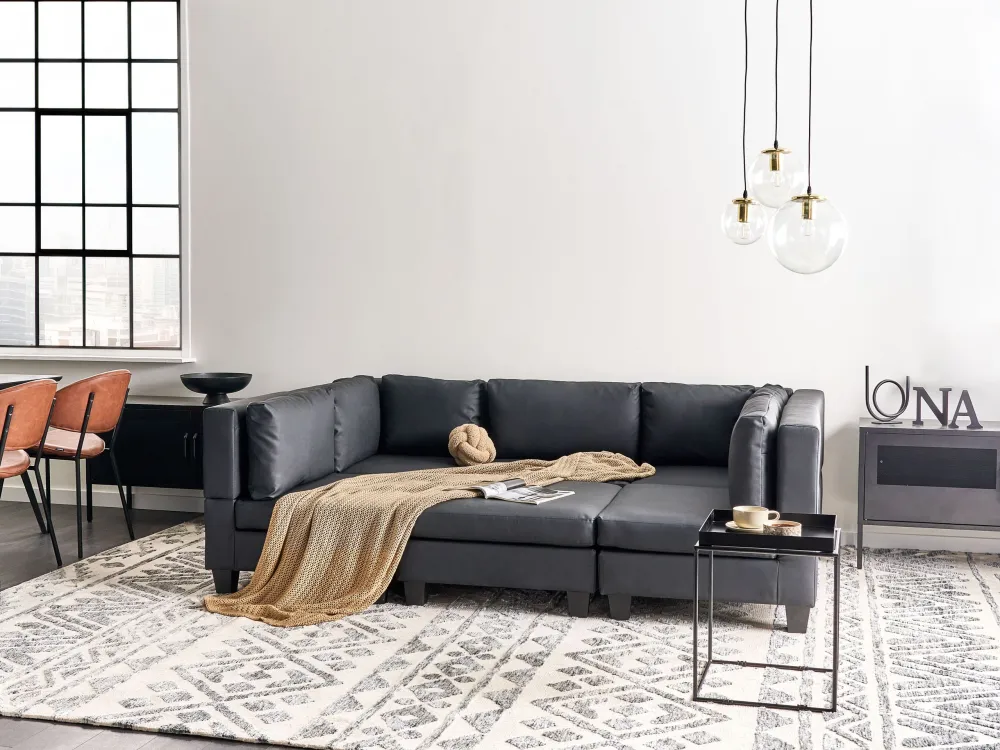 Divano modulare pelle sintetica nero 5 posti con pouf UNSTAD