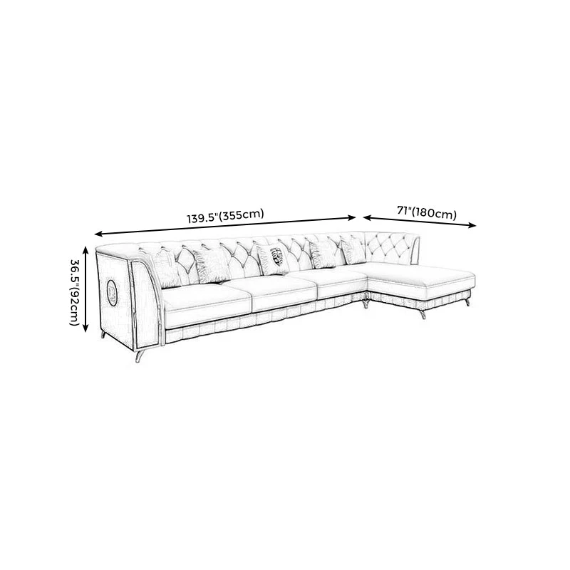 Divano e chaise longue vera pelle con schienale capitonnè e braccioli incassati Clearhalo