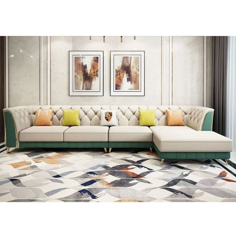 Divano e chaise longue vera pelle con schienale capitonnè e braccioli incassati Clearhalo