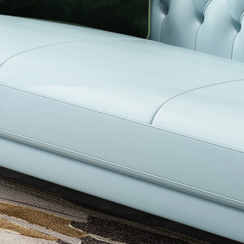 Divano Chesterfield moderno con schienale trapuntato vera pelle, con braccioli arrotolati Clearhalo
