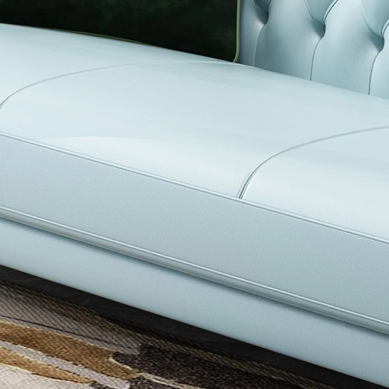Divano Chesterfield moderno con schienale trapuntato vera pelle, con braccioli arrotolati Clearhalo