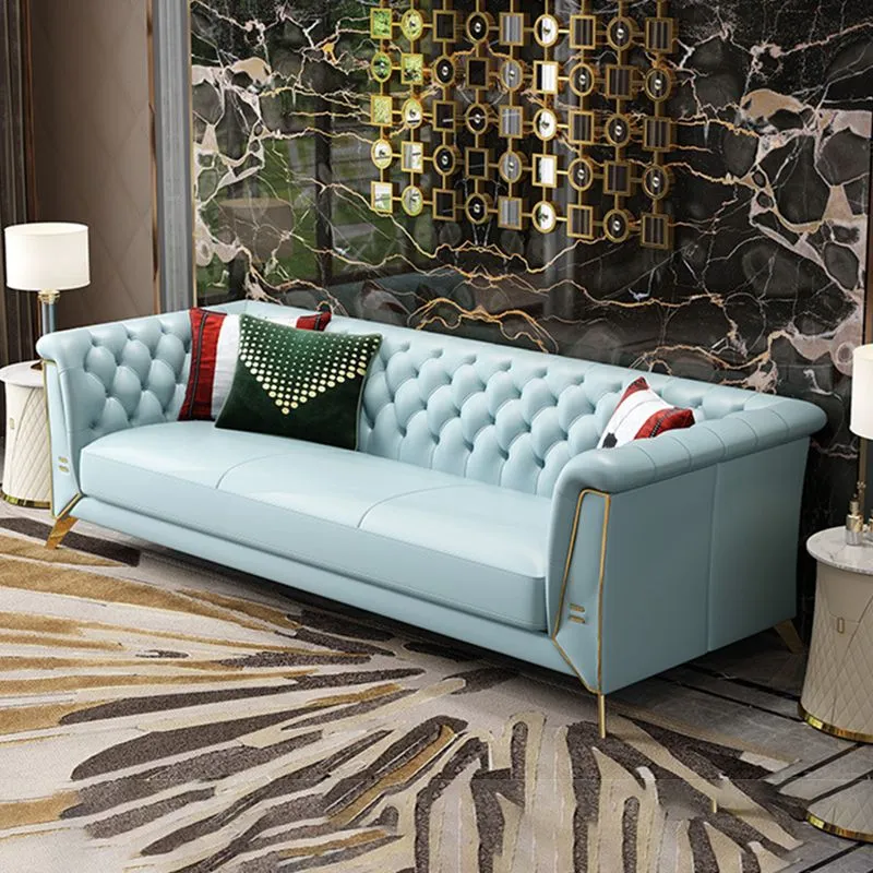 Divano Chesterfield moderno con schienale trapuntato vera pelle, con braccioli arrotolati Clearhalo