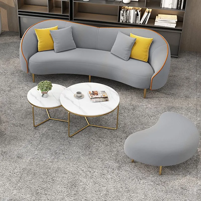 Divano ecopelle beige/grigio con braccioli inclinati e cuscini sostegno Clearhalo