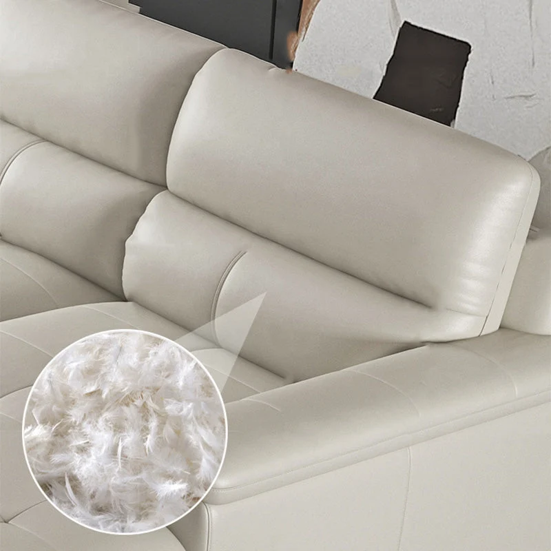 Divano moderno color crema con schienale alto e chaise longue componibile pelle con braccioli superiori Clearhalo