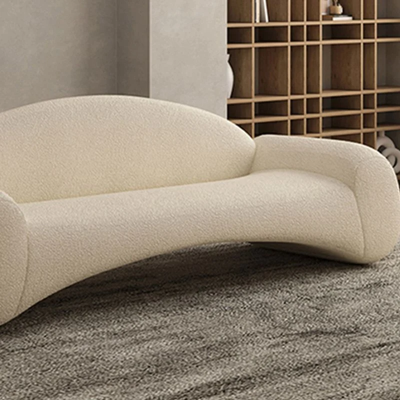 Divano moderno con schienale stretto. Divano curvo bianco Clearhalo
