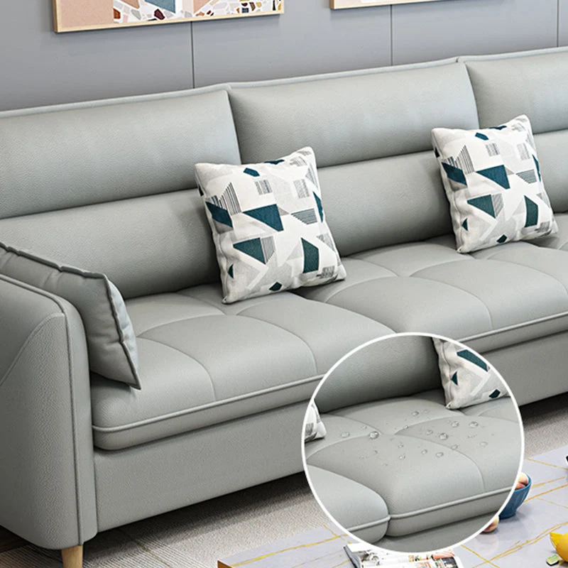 Divano scandinavo con schienale e pouf incluso per tre persone Clearhalo