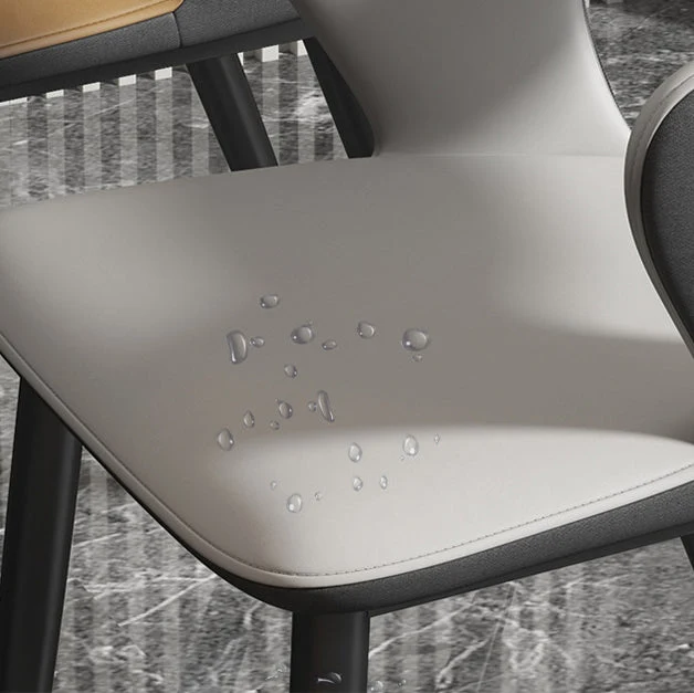 Poltrona da pranzo moderna pelle Poltrona imbottita con schienale aperto e gambe metallo Clearhalo