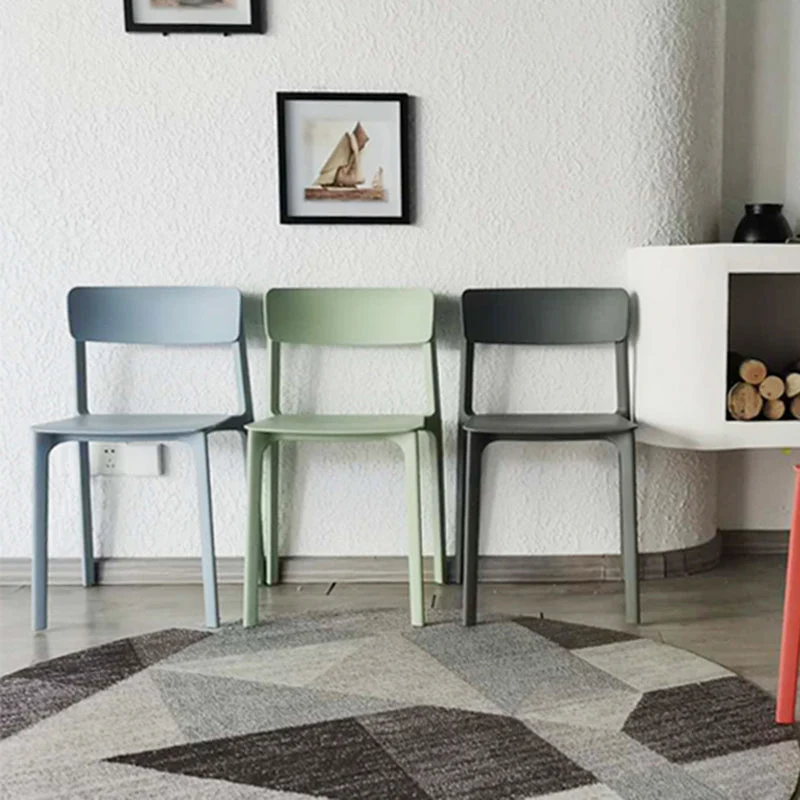 Sedia laterale da pranzo stile moderno impilabile plastica con schienale aperto Clearhalo