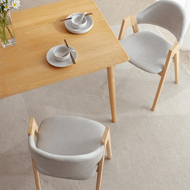 Sedia da pranzo aperta scandinava Milk Tea Shop con braccioli imbottiti con finitura opaca Clearhalo