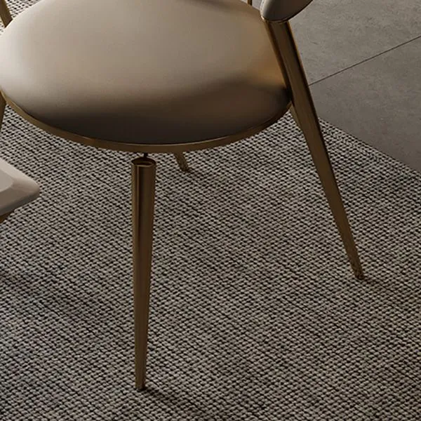 Sedia da pranzo laterale stile glam con schienale aperto ecopelle e base metallo Clearhalo