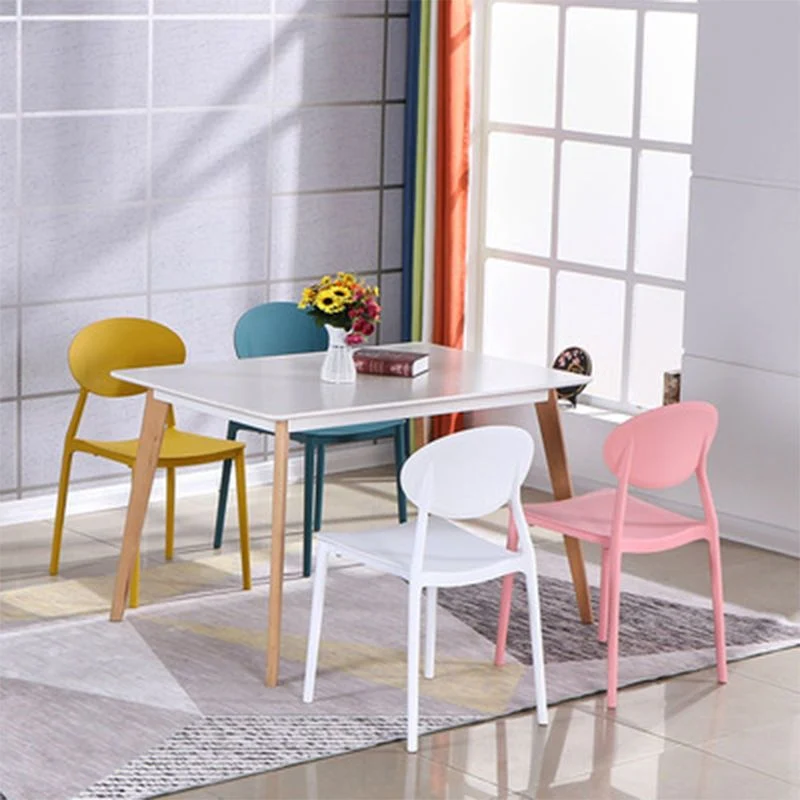 Sedia da pranzo moderna impilabile plastica con schienale aperto Clearhalo
