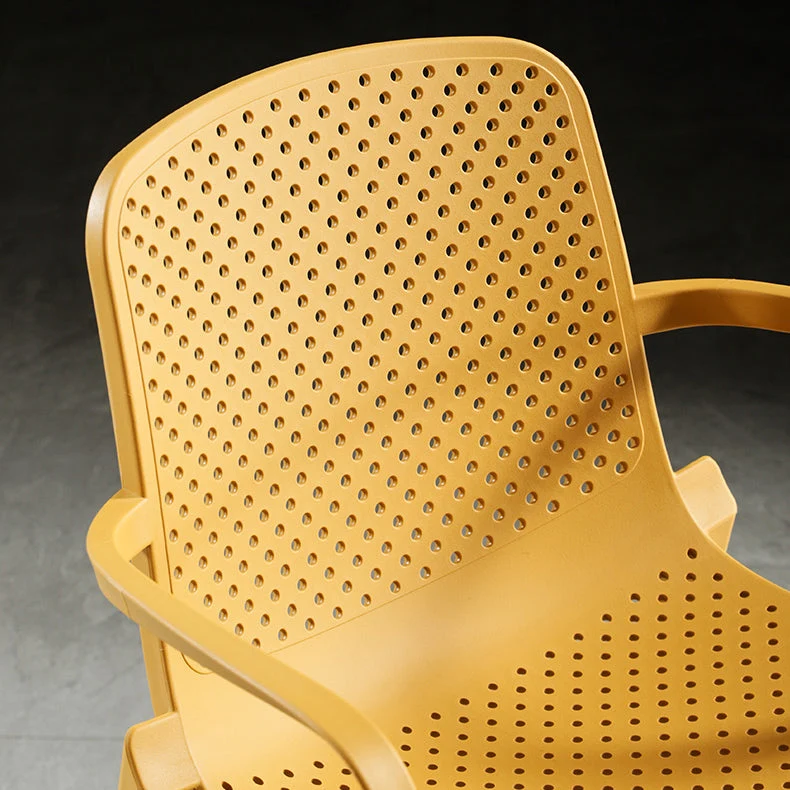 Sedia da sala da pranzo moderna plastica contemporanea con braccioli e schienale solido Clearhalo