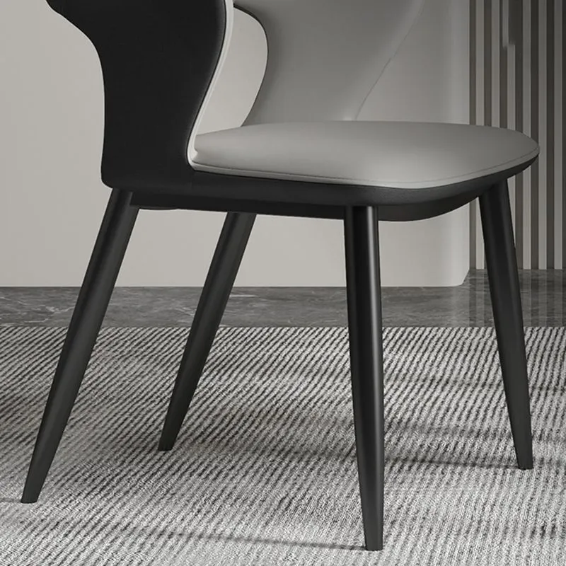 Sedie laterali con schienale aperto e braccioli dal design minimalista Sedia laterale ecopelle Clearhalo