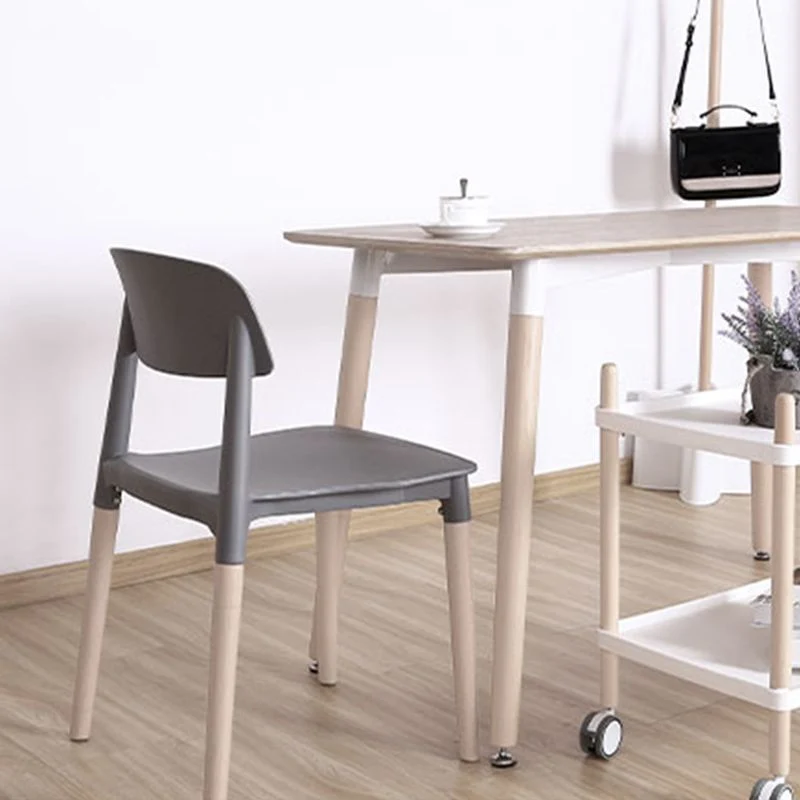 Sedie da pranzo impilabili plastica senza braccioli Sedia laterale con schienale aperto e gambe legno Clearhalo