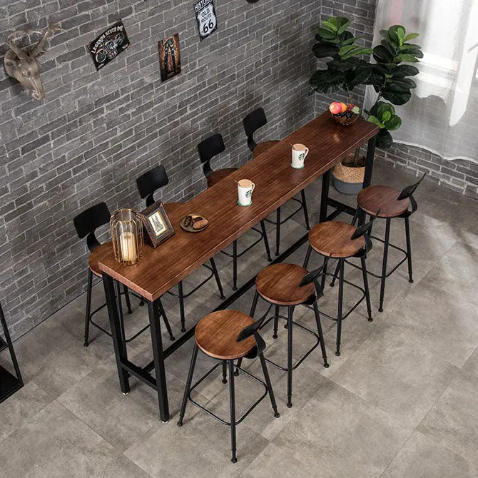 Tavolo da bar rettangolare con piano legno di pino marrone. Tavolo da bistrot moderno con base cavalletto nero Clearhalo