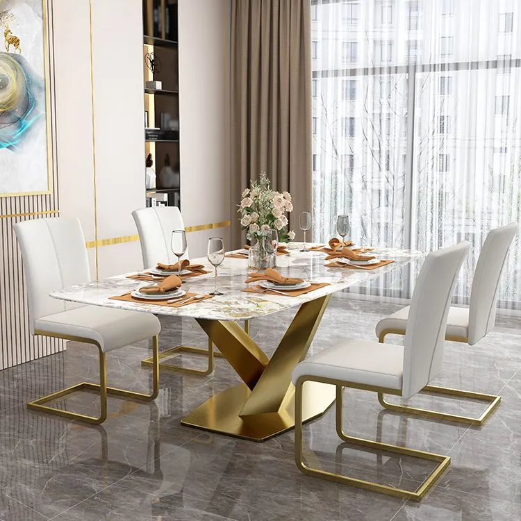 Tavolo con piano pietra sinterizzata per ristorante Tavolo rettangolare di lusso con piedistallo metallo dorato Clearhalo