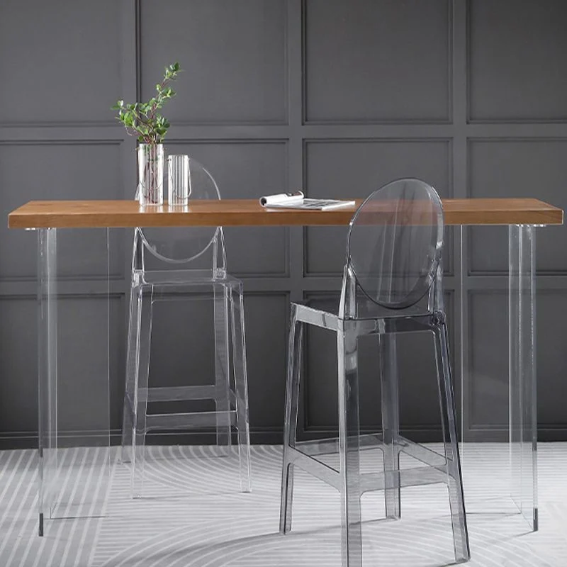 Tavolo da pranzo con piano legno massello stile moderno con base acrilico Clearhalo