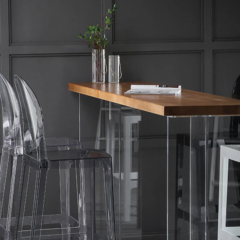 Tavolo da pranzo con piano legno massello stile moderno con base acrilico Clearhalo