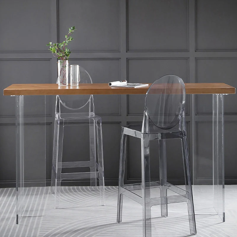 Tavolo da pranzo con piano legno massello stile moderno con base acrilico Clearhalo