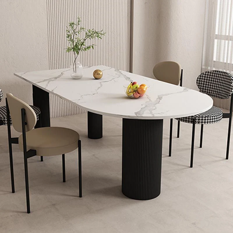 Tavolo da pranzo con piano ovale bianco Tavolo da pranzo moderno con piano pietra per sala da pranzo Clearhalo