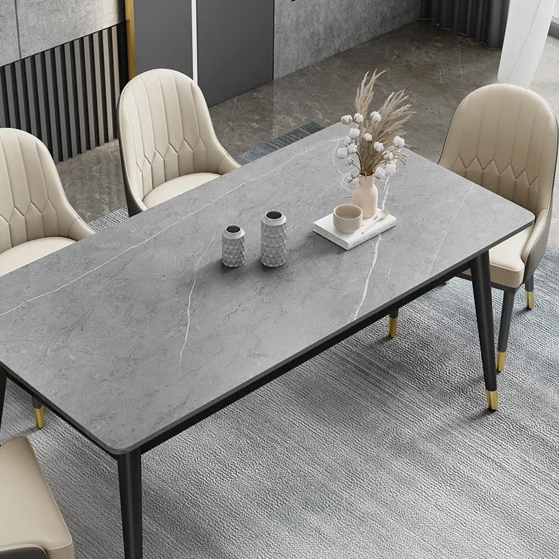 Tavolo da pranzo con piano pietra stile Glam Tavolo da pranzo rettangolare con 4 gambe metallo Clearhalo