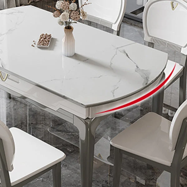 Tavolo da pranzo moderno allungabile con piano pietra rotondo bianco per la casa Clearhalo