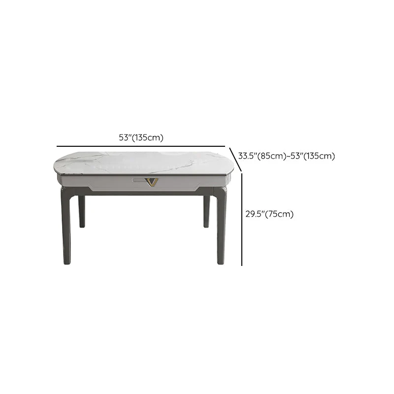 Tavolo da pranzo moderno allungabile con piano pietra rotondo bianco per la casa Clearhalo