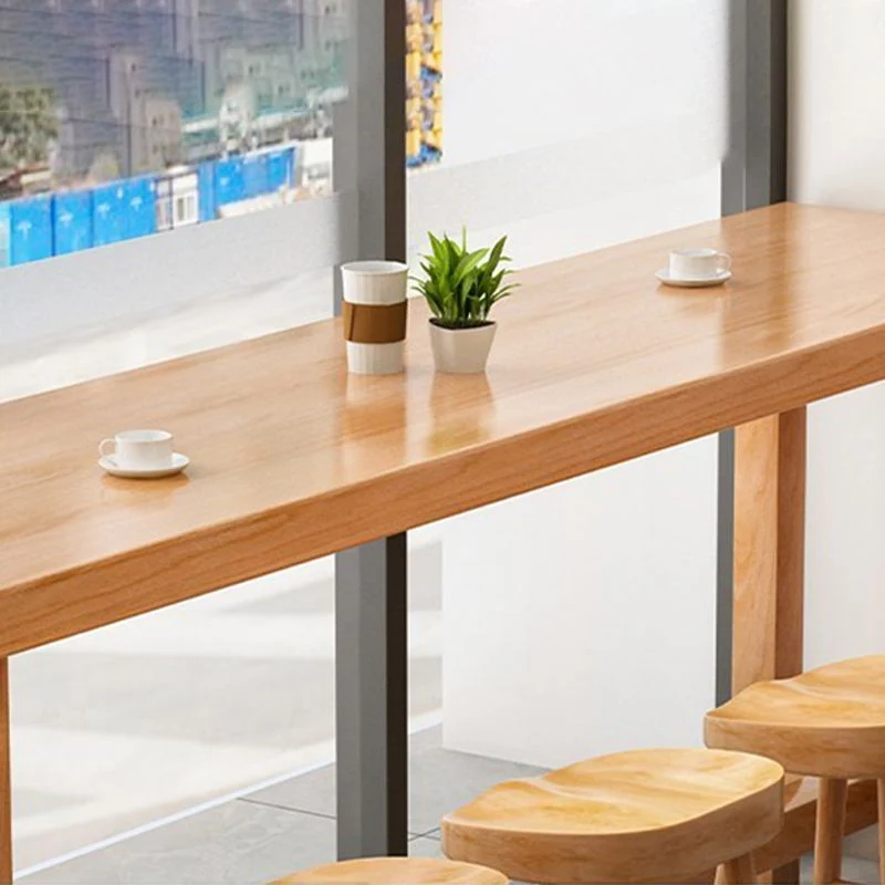 Tavolo da pranzo moderno da bar rettangolare beige, tavolo da bistrot per interni legno di pino con poggiapiedi Clearhalo