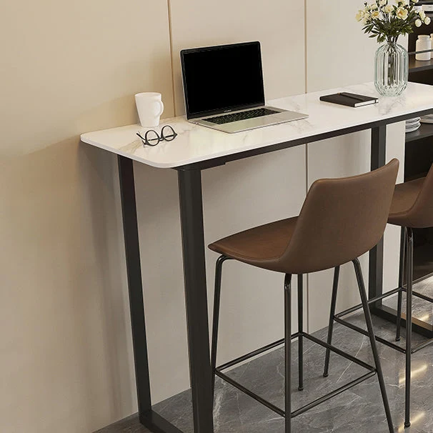 Tavolo da pranzo moderno da bar rettangolare con piano pietra sinterizzata e base metallo Clearhalo