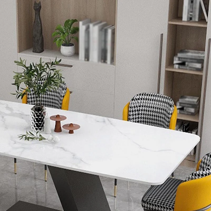 Tavolo da pranzo moderno con piano pietra Tavolo da pranzo rettangolare con base nera Clearhalo