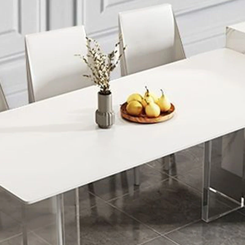 Tavolo da pranzo moderno con piano pietra sinterizzata Tavolo rettangolare con base plastica Clearhalo