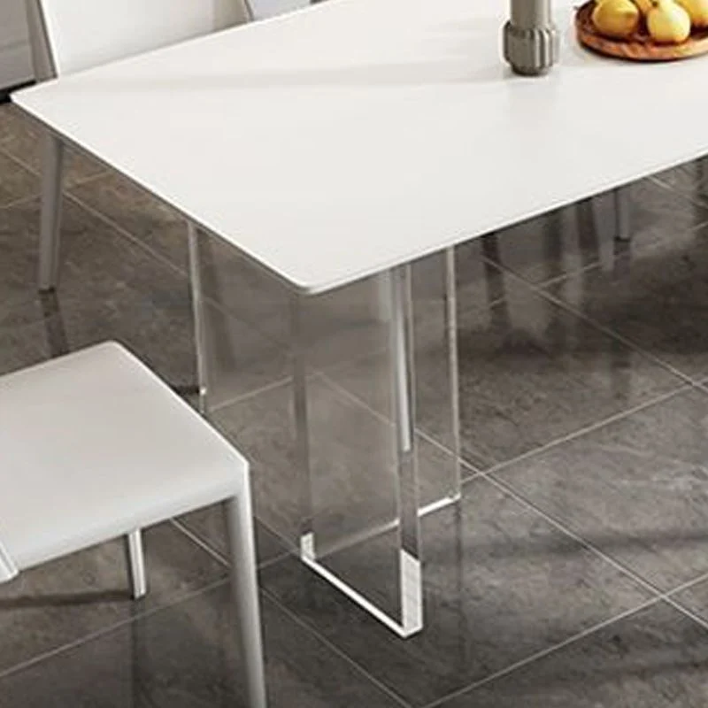 Tavolo da pranzo moderno con piano pietra sinterizzata Tavolo rettangolare con base plastica Clearhalo