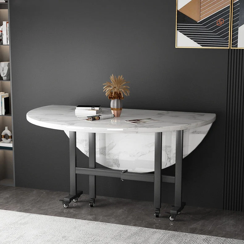 Tavolo da pranzo moderno pieghevole con piano rotondo legno e gambe metallo Clearhalo
