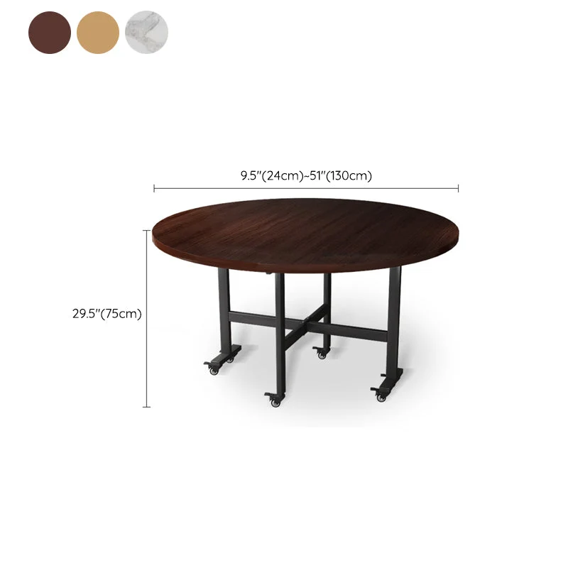 Tavolo da pranzo moderno pieghevole con piano rotondo legno e gambe metallo Clearhalo
