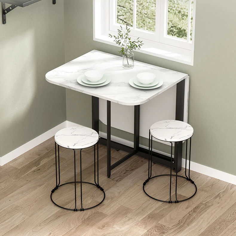 Tavolo da pranzo moderno pieghevole rettangolare con piano legno e base metallo nero Clearhalo