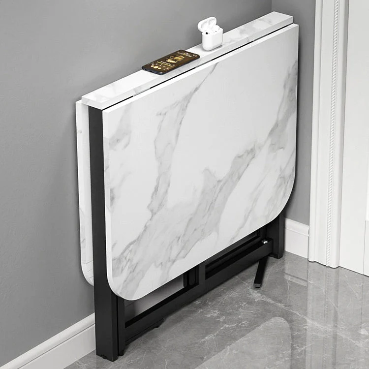 Tavolo da pranzo moderno pieghevole rettangolare con piano legno e base metallo nero Clearhalo