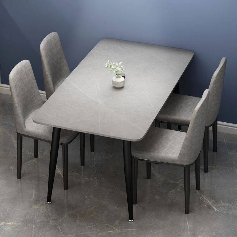 Tavolo da pranzo moderno rettangolare pietra rotondo con base metallo Clearhalo