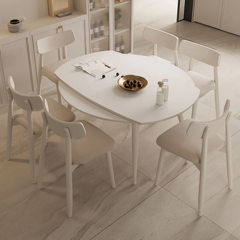 Tavolo da pranzo moderno rotondo allungabile. Piano pietra bianca con doppia anta Clearhalo