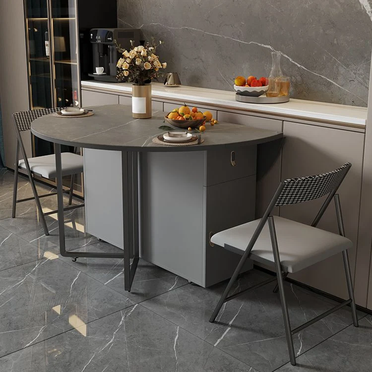 Tavolo da pranzo moderno rotondo con piano pietra pieghevole per piccoli spazi Clearhalo