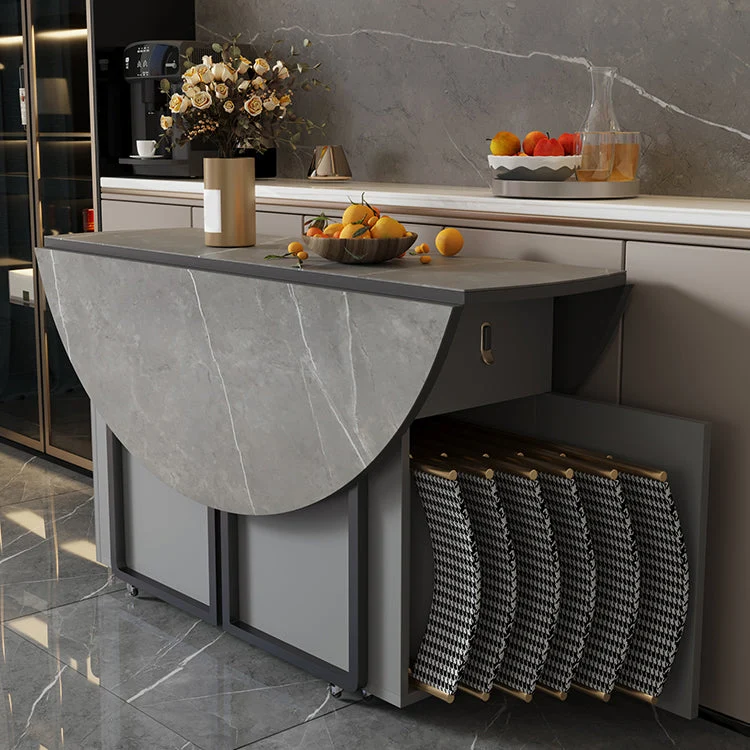 Tavolo da pranzo moderno rotondo con piano pietra pieghevole per piccoli spazi Clearhalo