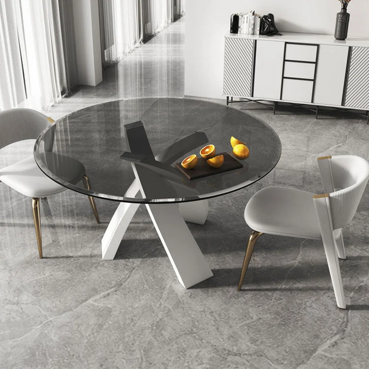 Tavolo da pranzo moderno rotondo con piano vetro e base bianca Clearhalo