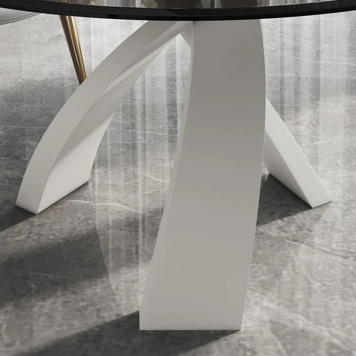Tavolo da pranzo moderno rotondo con piano vetro e base bianca Clearhalo