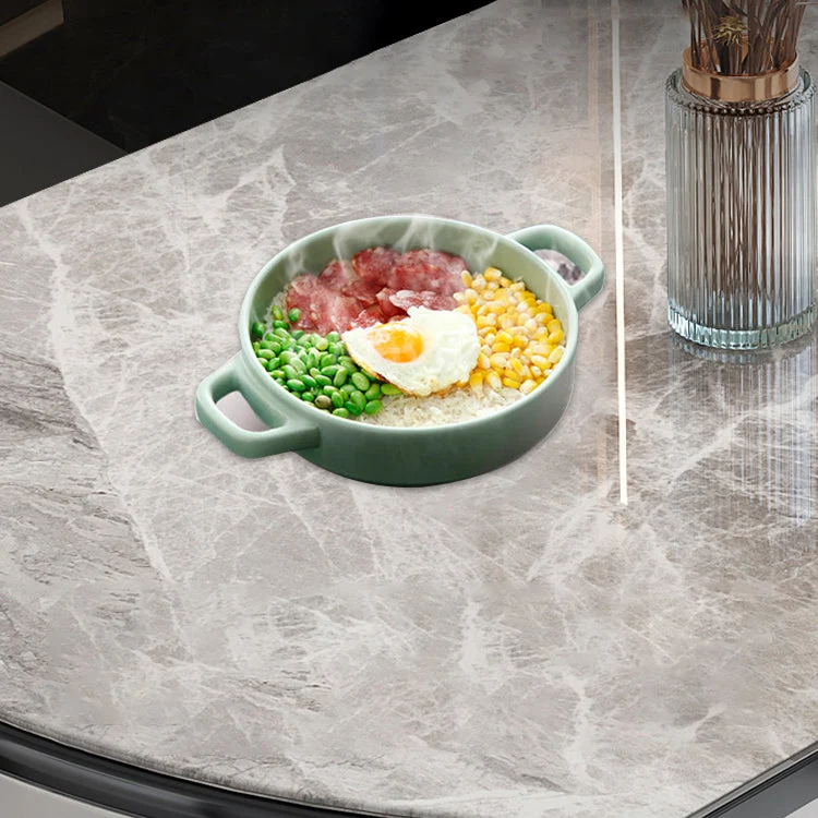 Tavolo da pranzo moderno rotondo espandibile scomparsa con piano pietra e base legno nero Clearhalo