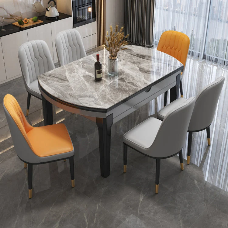 Tavolo da pranzo moderno rotondo espandibile scomparsa con piano pietra e base legno nero Clearhalo