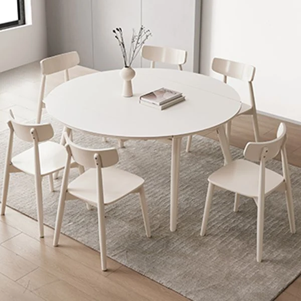 Tavolo da pranzo rotondo allungabile moderno con piano pietra bianca con doppia anta Clearhalo