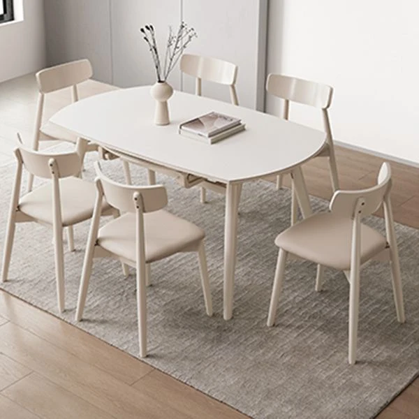 Tavolo da pranzo rotondo allungabile moderno con piano pietra bianca con doppia anta Clearhalo