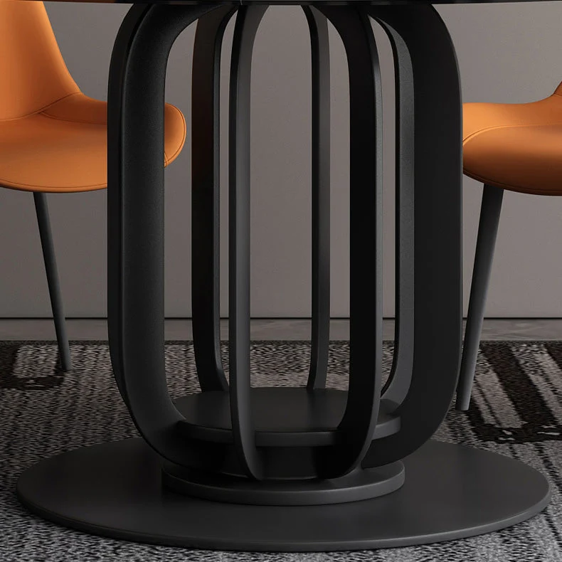 Tavolo da pranzo rotondo con piano pietra Tavolo da pranzo moderno con base metallo Clearhalo