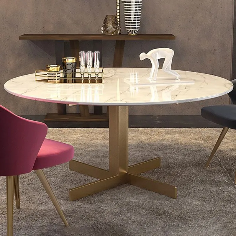 Tavolo da pranzo rotondo minimalista stile glam metallo e pietra per il soggiorno di casa Clearhalo